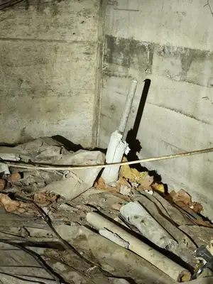 Damaged flooring being removed