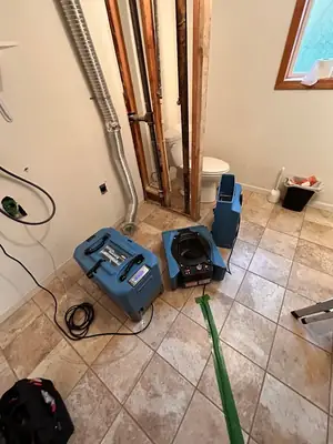 Drying equipment in a stripped room