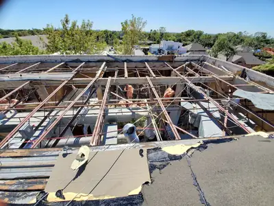 Aerial view of a fire-damaged roof