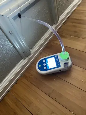 Air sampler on a floor
