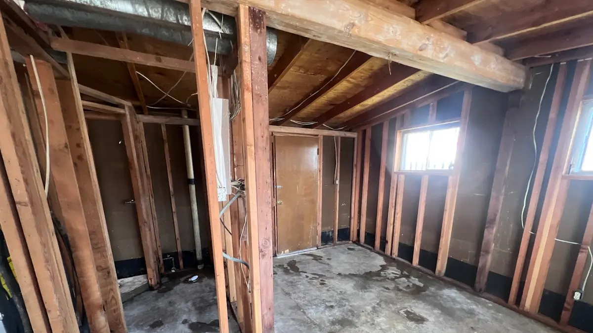 Room stripped back to the framing