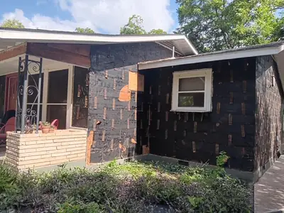 House with walls stripped back