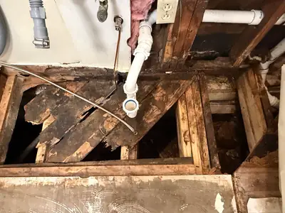 Damaged cabinet base removed