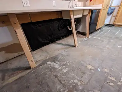 Floor removed under a desk area