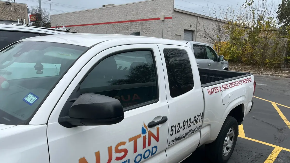 Austin Fire & Flood branded pickup truck