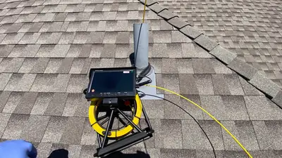 Inspection camera on a shingle roof