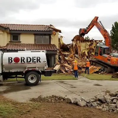 Border Demolition & Environmental truck at a demolition site