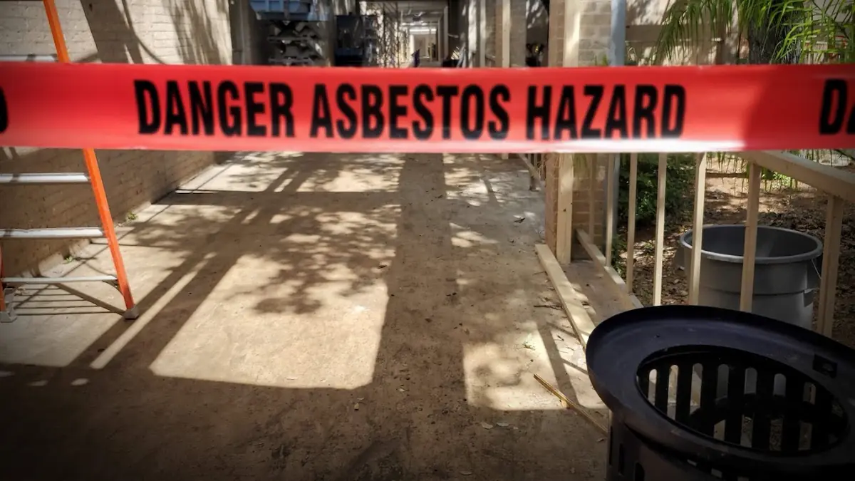 Danger tape sealing off an asbestos work area