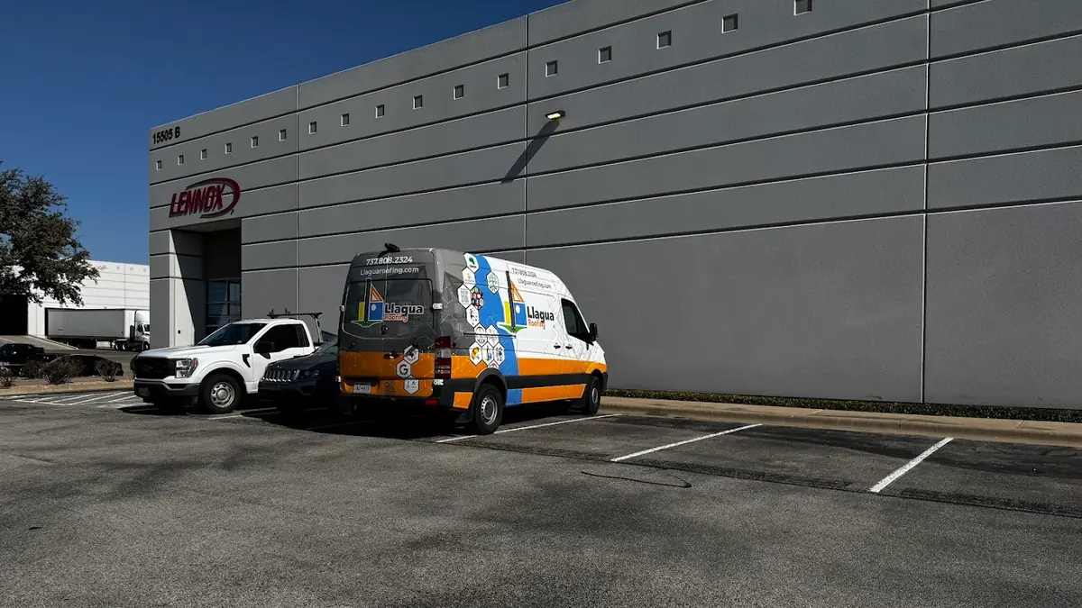 Service van parked outside a commercial building