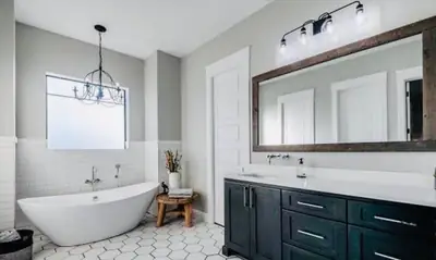 Finished bathroom with a freestanding tub