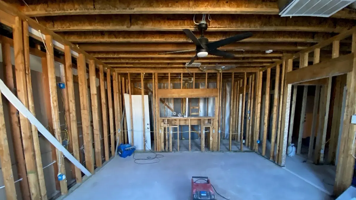 Room stripped to the framing with equipment in place