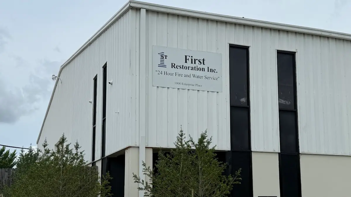 First Restoration, Inc. building with company signage