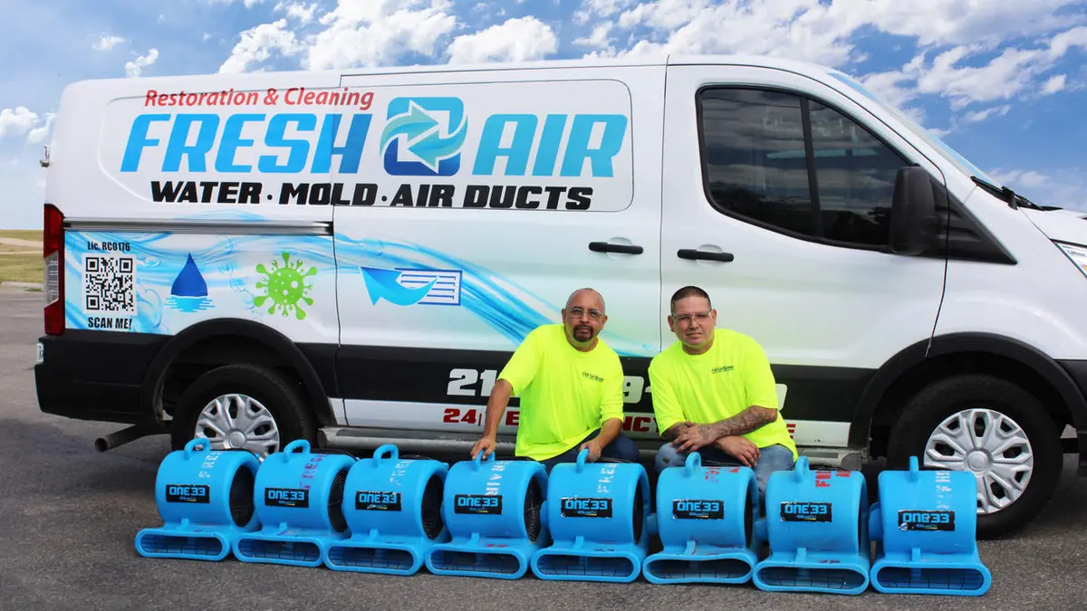 Fresh Air Restoration and Cleaning branded van with crew and air movers