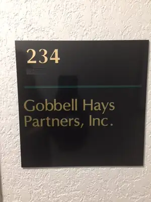 Suite sign for Gobbell Hays Partners, Inc.