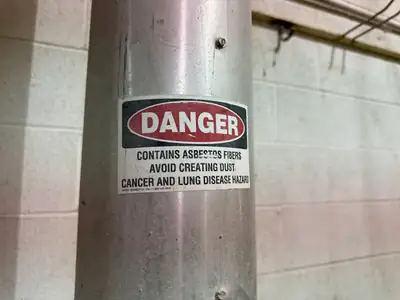 Danger warning sign on a building tank