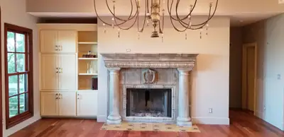Finished living room with a fireplace
