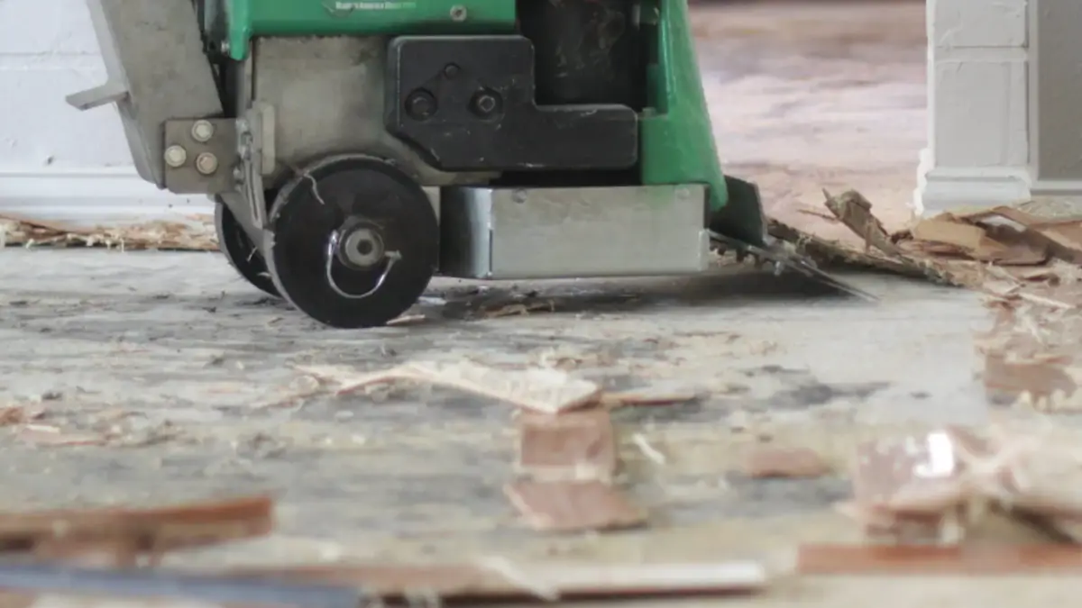 Floor grinder removing old flooring