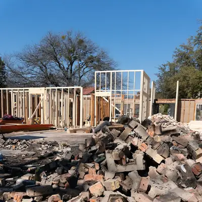 Fire-damaged house being demolished