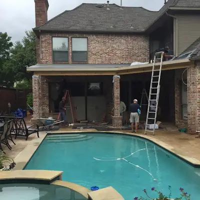 Backyard pool and two-storey home