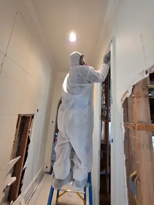 Technician in a protective suit