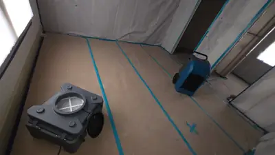 Air scrubber in a protected room