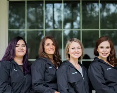 Hedderman Services office staff standing together