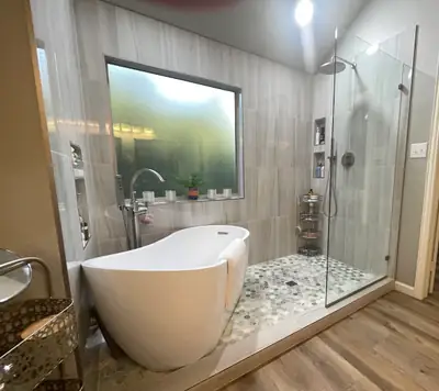Finished bathroom with a freestanding tub