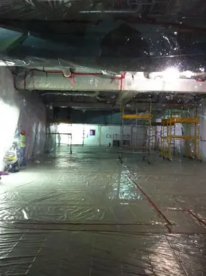Gutted commercial interior during remediation