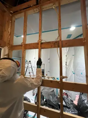 Containment along a wall of windows
