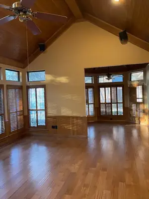 Wood-panelled interior with a vaulted ceiling