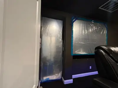 Containment sheeting set up in a home