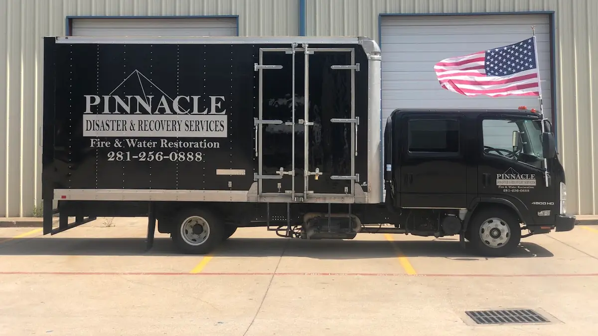 Pinnacle Disaster & Recovery Services branded box truck