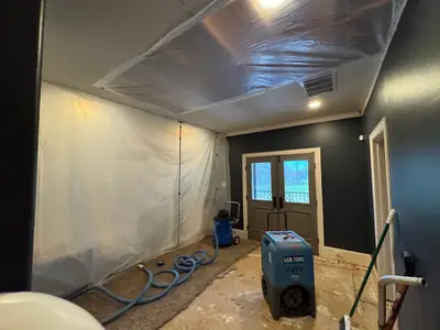Room with containment and drying equipment