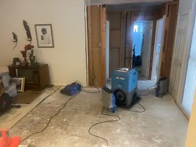 Air mover drying a stripped room