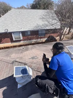 Inspector on a roof
