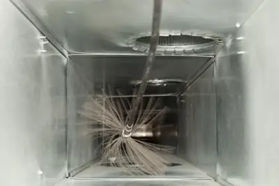 Brush cleaning inside an air duct