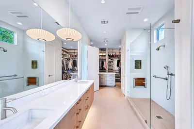 Finished bathroom with a walk-in shower