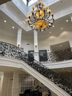 Grand foyer with a chandelier