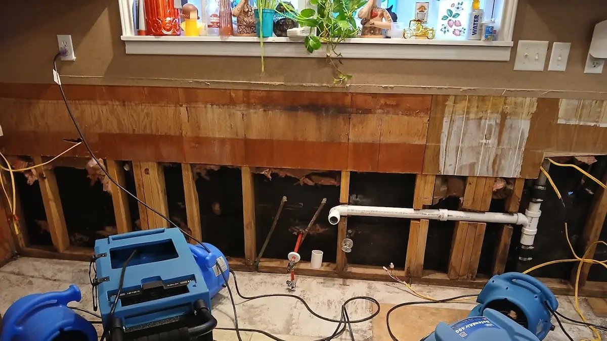 Drying equipment in a stripped kitchen