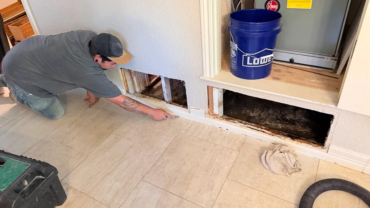 Technician working on a damaged floor