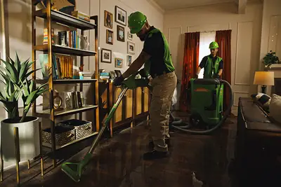 Technician working in a living room