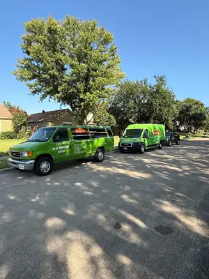 SERVPRO vehicles on a residential street