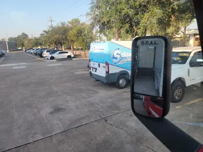 Service vehicles in a parking lot