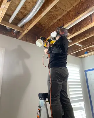 Technician working on a ceiling