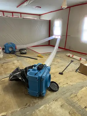 Air mover drying a room