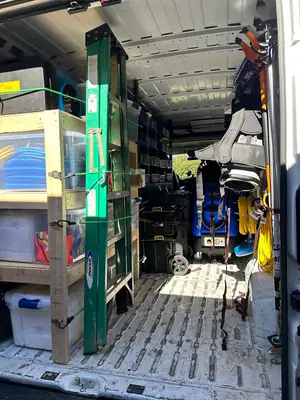 Equipment racked inside a work van