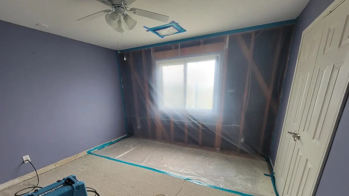 Room with floor protection and a dehumidifier