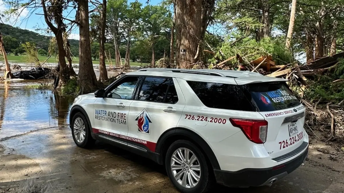 Branded SUV parked on a job