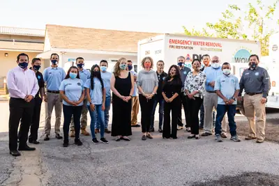 The WOW Total Cleaning & Restoration team outside the office