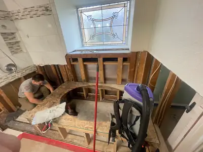 Kitchen wall stripped with drying equipment